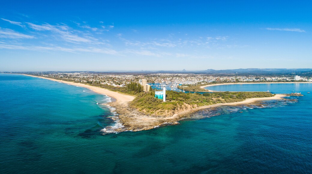 Beautiful aerial sunrise with beach, water, boats, shops and lovely holiday feel at Mooloolaba, Sunshine Coast, close to Brisbane in Queensland. Top view near Point Cartwright, river mouth and tourist