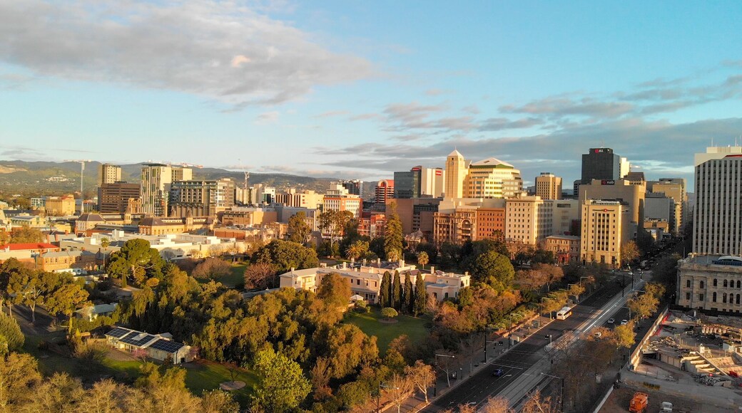 ADELAIDE, AUSTRALIA - SEPTEMBER 16, 2018: Aerial view of city skyline at sunset. Adelaide is the main city of South Australia State