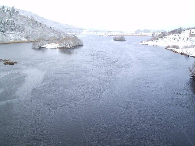 The Kyle of Sutherland. Looking up the Kyle from the Invershin Railway Bridge On a Snowy day.