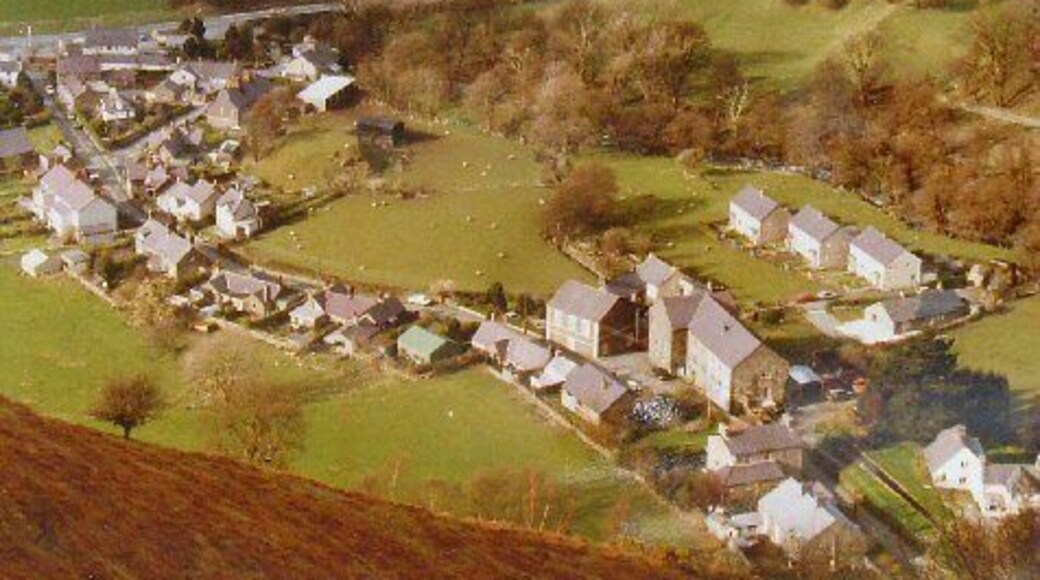 Abergwyngregyn Village. Viewed from the S from the steep ridge running down from Ffridd Ddu. The village below Aber Falls.
