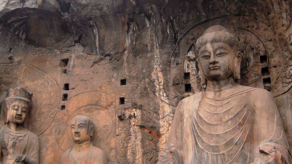 Housing tens of thousands of statues of Buddha and his disciples, The Longmen Grottoes or Longmen Caves are one of the finest examples of Chinese Buddhist art.
