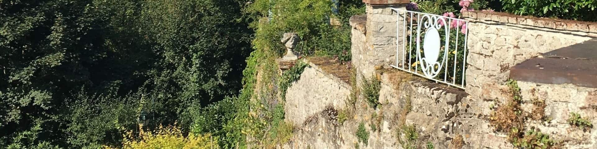 The charming town of Gerberoy in Picardie near the Normandie coast is a quiet, sleepy place that is a joy to walk through. You'll find hidden cafes and numerous rose gardens. The garden in the photo is a must visit for its beautiful landscaping and lovely flowers.