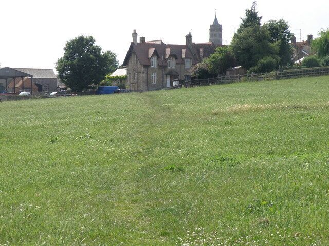 Footpath to Irthlingborough The Nene Way long distance footpath heading up to a row of terrace houses on Lime Street in Irthlingborough.