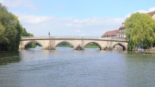 Huntingdon Bridge, near to Huntingdon, Cambridgeshire, Great Britain. Old Huntingdon Bridge taken from middle of River Great Ouse
