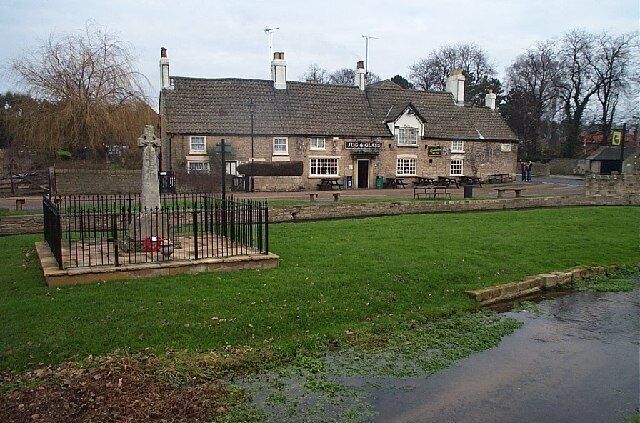 Jug & Glass, Nether Langwith. The Jug and Glass Public House at Nether Langwith which has a stream running in front of it.