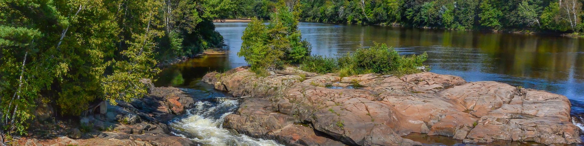 Some rapids along the Riviere Rouge (Red River) in Brebeuf, Quebec in summer