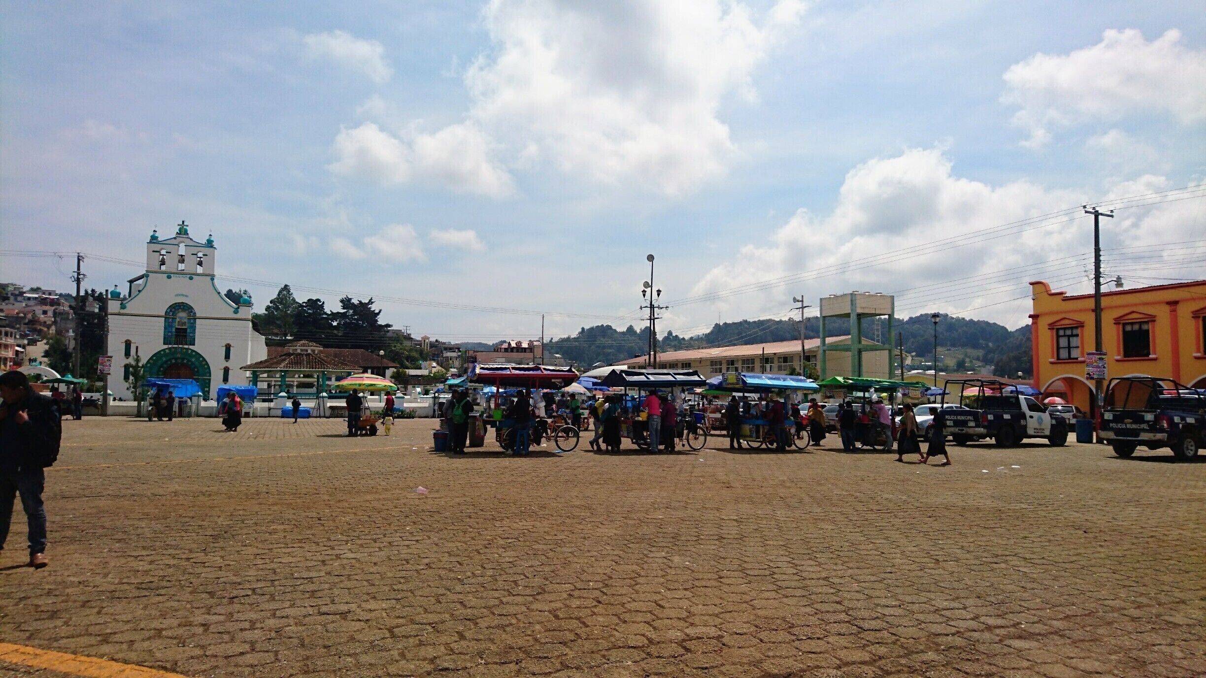 A very unique place close to San Cristóbal de las Casas.
The reason to go is the church. The religion of the people of Chamula is a very special mix between Mayan religions and Christianity. When you enter the church you find yourself in another world. There are no benches, the floor is covered in pine needles and there are thousands of candles on the floor. Shamans murmur spells, there are chicken sacrifices and the whole atmosphere is a bit surreal. 
(Btw photography is prohibited) 