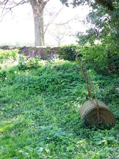 Churchyard, St Laurence Church, Rode I found this abandoned roller in the corner of the churchyard.