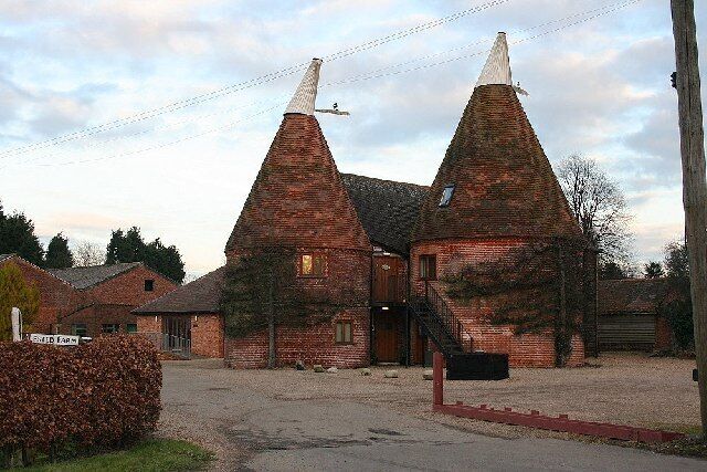 Converted Farm Buildings near Chart Sutton, Kent. These old Oast Houses have been converted into offices for rent. They were once used to dry the hops grown locally.