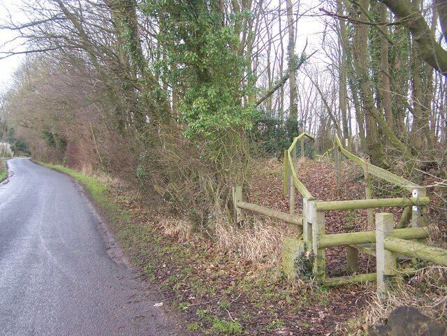 Footpath on Back Lane Footpath goes through paddocks on rear of Amber Green Cottages, leads to Wierton Road. Had small note on fence 'These animals bite' ,although I only saw horses in stables.
