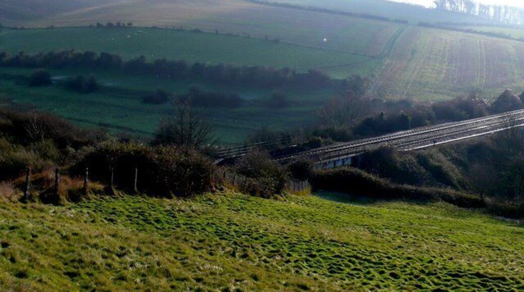 Weymouth Relief Road (11) This shows the Bincombe railway bridge over the old A354. The new road will pass along the far side of the railway skirting round the west (right) of the hill in the distance, the Knoll. The strip lynchets on the left are running along the south side of the Bincombe valley