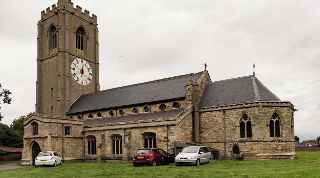 The church dates from the 13th century onwards, the chancel has been rebuilt twice, in 1741 and 1870. There is a western tower with arched openings to north and south allowing pedestrians to pass through, a nave with clerestory, north and south aisles, south porch, and chancel with apse. The tower is of three stages from the 14th century, but the belfry stage is from the 15th century. It is buttressed with embattled parapets. There are six bells. The church is famous for its one-handed clock, which dates from the 17th century. The dial is 16 feet in diameter and believed to be the largest single-handed clock in Europe. The nave arcades have five bays with octagonal piers. The north aisle is from the 14th century, with the south aisle being from the 15th century, both have human head label stops. At the east end of the south aisle is a Lady Chapel. The nave has a 14th century king post roof. The 14th century chancel arch once had a rood loft, and the access doors still remain on the south side. The south porch dates from the 15th century and has a parvis above. The chancel, with polygonal apse, was rebuilt in 1870 by T.C. Hine and Son. The church contains several memorial plaques to members of aircrew from RAF Coningsby killed in flying accidents and WWII.