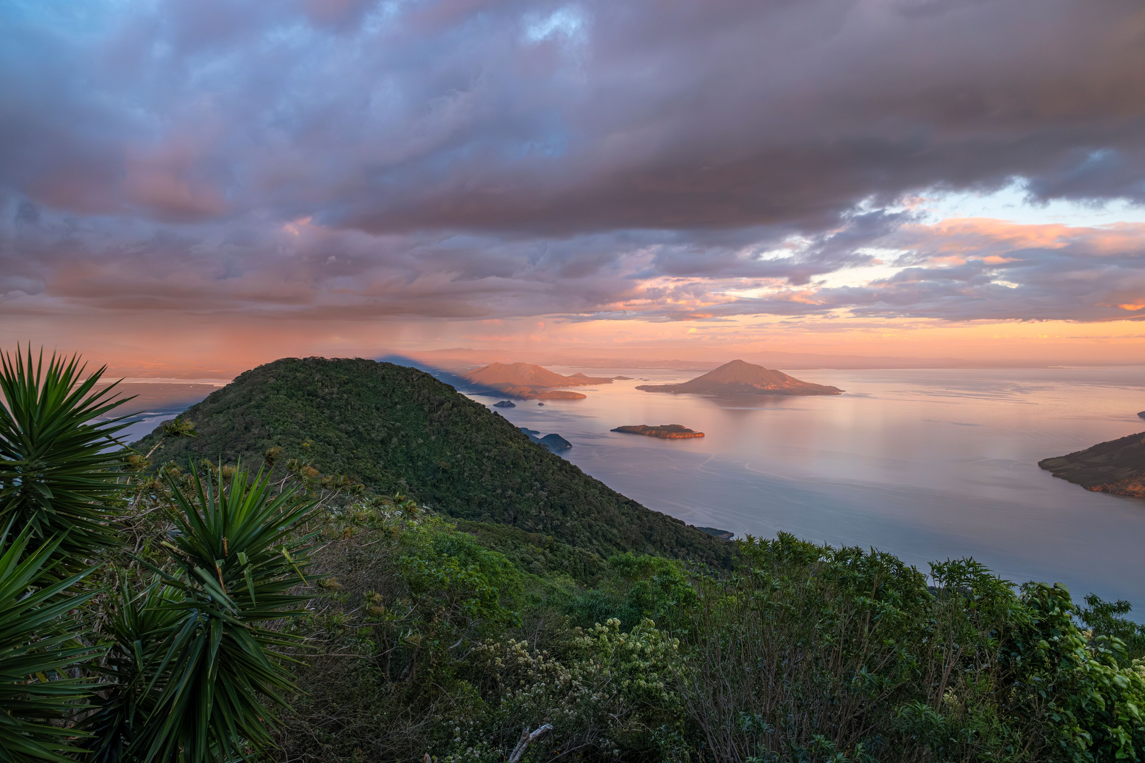View of Fonesca Gulf and La Union Bay from the top of Conchagua Volcano observation platform at sunset hour in El Salvador. The place were borders of Honduras, Nicaragua and El Salvador meet.