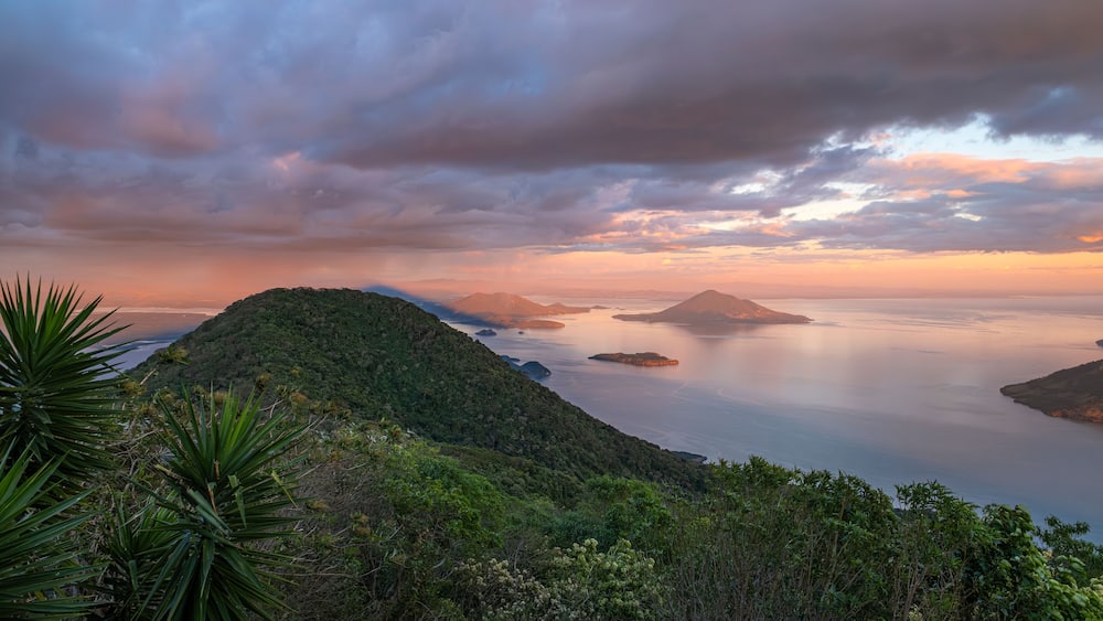 View of Fonesca Gulf and La Union Bay from the top of Conchagua Volcano observation platform at sunset hour in El Salvador. The place were borders of Honduras, Nicaragua and El Salvador meet.