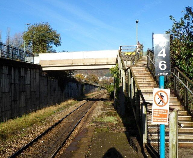 Steps up to a footbridge, Tonypandy Railway Station, Data from Geograph: Description: Viewed from the NW edge of the only platform at the station,on the Rhondda Line. ICBM: 51.619655207749, -3.4501658605901 Location: (about 1 km from) near to Trealaw, Rhondda Cynon Taff/Rhondda Cynon Taf, Great Britain.