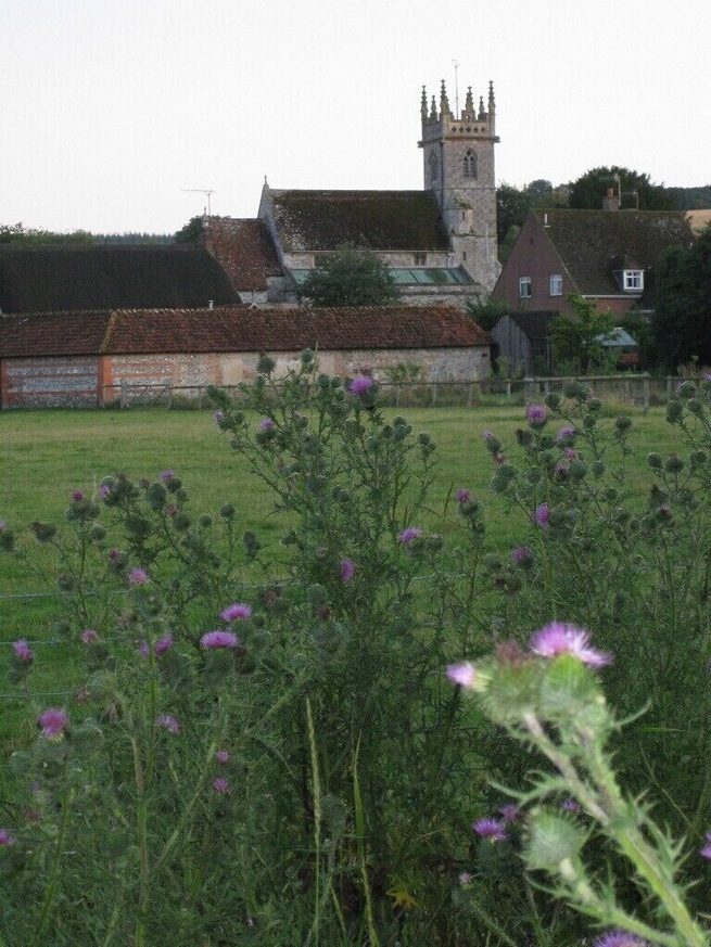St Giles Church, Great Wishford, Wiltshire, England from near the Stoford Bridge