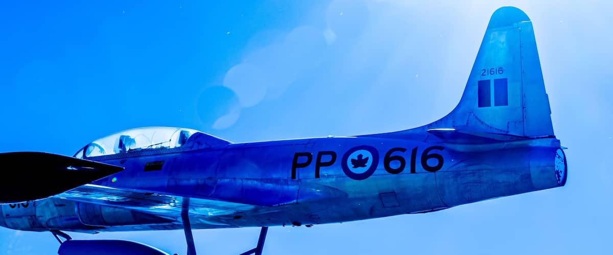 A vintage aircraft with the registration number PP 616 in flight.