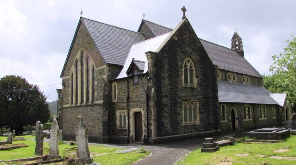 Entrance path to St Cynog's Church, Ystradgynlais The church is set back 100 metres from the south side of the B4599 Heol Eglwys. St Cynog's Church is in the Church in Wales Diocese of Swansea and Brecon. The church was built in the Victorian Gothic style between 1858 and 1861. Born c434AD, Cynog son of Brychan, usually known as Saint Cynog, was a fifth century British martyr and saint.