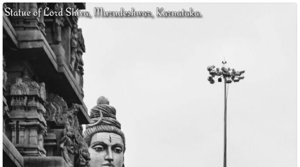 #Murudeshwar, Karnataka: Lord #Shiva #statue at the background of the #temple #Gopura.
#lordshiva
#blackandwhite