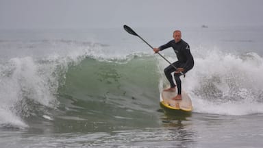On the beach, stand up paddle .