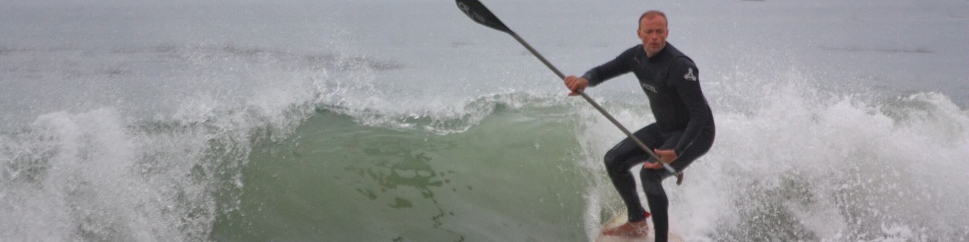On the beach, stand up paddle .