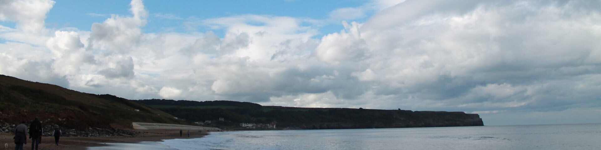 Visit Sandsend - great beach, lovely beachside cafes, walk along the beach to Whitby and look for fossils. #beachbound #Yorkshire