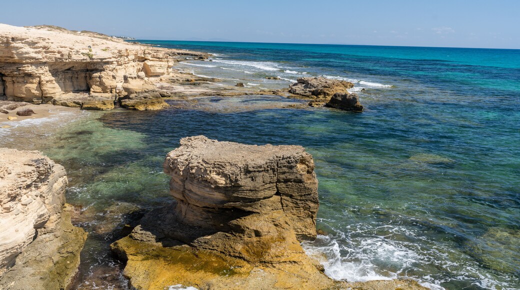 Rocky Shoreline and Turquoise Waters on Hergla Coast, Tunisia