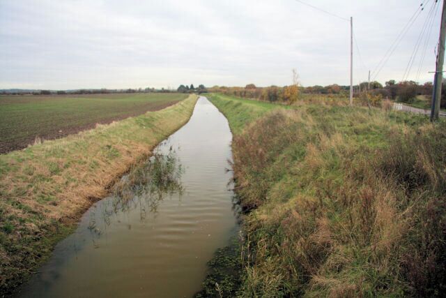 Drain at Marsh Common Looking eastwards from the road bridge over the drain.
