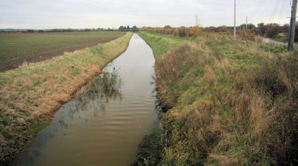 Drain at Marsh Common Looking eastwards from the road bridge over the drain.
