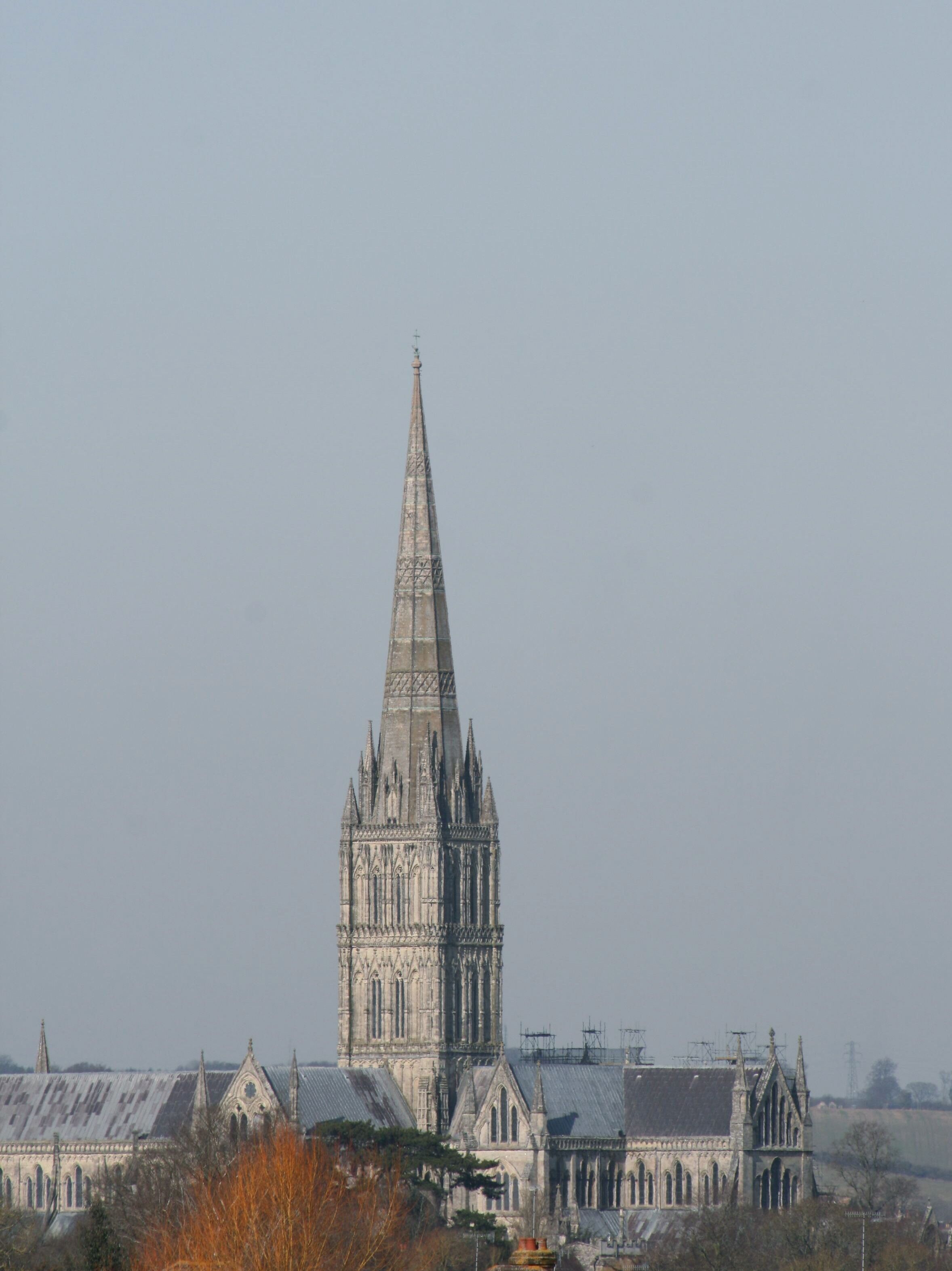 Salisbury Cathedral at a distance of 1.25 miles (2 km) from the south east on the A338 Fordingbridge Road close to the village of Britford. The image is dedicated to the students, the academic staff, the supporting and administrative staffs at the University of Leeds Dental Institute, who bent the rules just a little to salvage Brian Burnell's holiday in Yorkshire in 2010, for which he is very grateful. Image uploaded by me User:George.Hutchinson from a photograph taken by and supplied by Brian Burnell. Wikipedia editors are reminded that the copyright remains with the photographer, and that the terms of the Creative Commons licence; that allow editors to reuse this image apply to Wikipedia editors also, as they do to other re-users of this image. Breaches of the licence terms are not only unlawful, but are also antisocial, in that breaches discourage photographers from making their images freely available to everyone without payment. Wikipedia re-users are also reminded of the license terms that derivatives of this image should not imply that the adaptation is endorsed or approved by the author or copyright holder. Neither should derivatives be presented as the creation of the author or copyright holder, while clearly stating that the adaptation is a derivative of the original. Attribution online should be in this format Brian Burnell. On the printed page, a simpler form is acceptable - example: "Image: Brian Burnell". Non-Wikipedia users are requested to advise Brian Burnell of its use other than on Wikipedia.