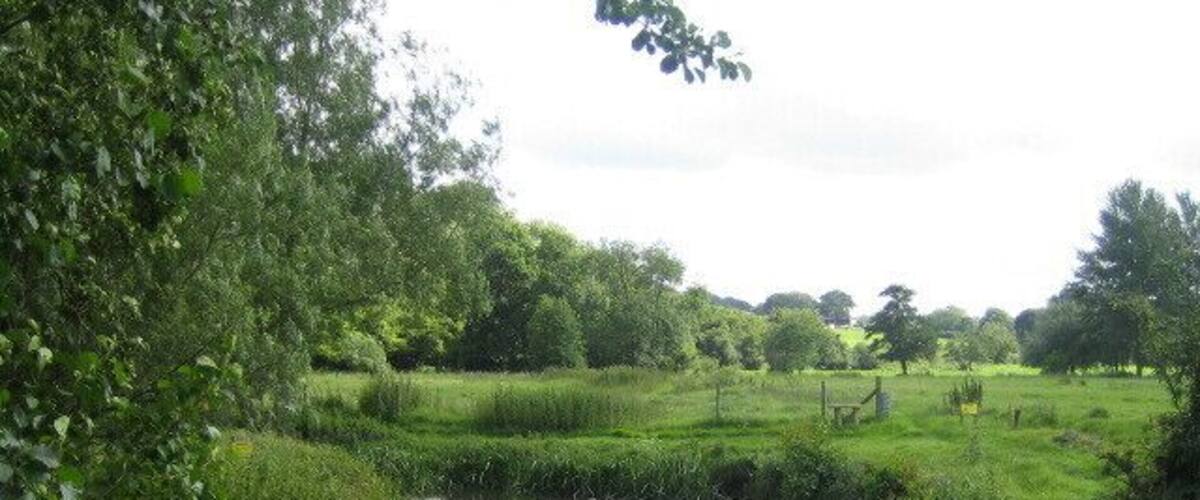 River Nadder near Teffont Evias The River Nadder is a chalk stream river with clear water and abundant fish and is the most significant of the tributaries of the Hampshire Avon. The river rises near Donhead St Mary east of Shaftesbury, and flows 32km to Wilton and through the park of Wilton House after where it joins the River Wylye. After a couple of miles the combined rivers join the River Avon close to Salisbury Cathedral. From Upper Chicksgrove - about 4km upstream - to Wilton the river is a Special Area of Conservation (SAC). This view looking upstream shows the river as it meanders across the 150m wide valley floor.