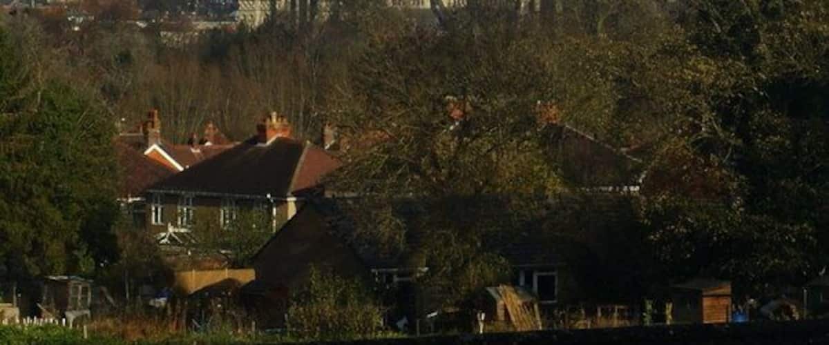 View From Harnham Hill, Salisbury Looking down across the houses, in the direction of Salisbury Cathedral. The rivers Avon and Nadder flow through the bottom of the valley, on this side of the cathedral, demonstrating that the cathedral is built on higher ground.