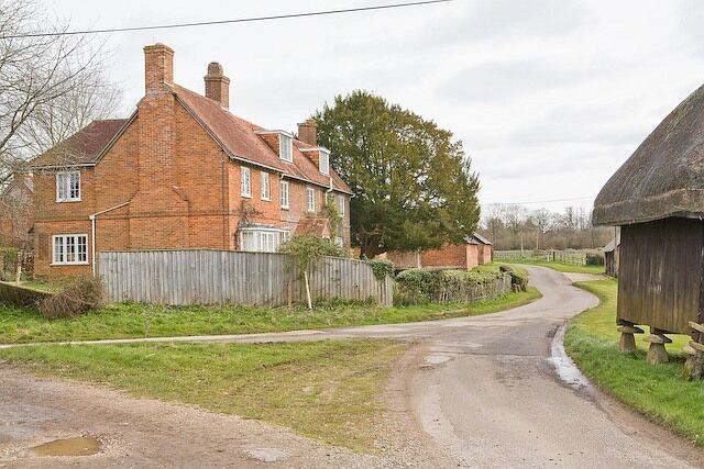 Manor Farm house, Church Lane A track named Compton's Drive is at left.