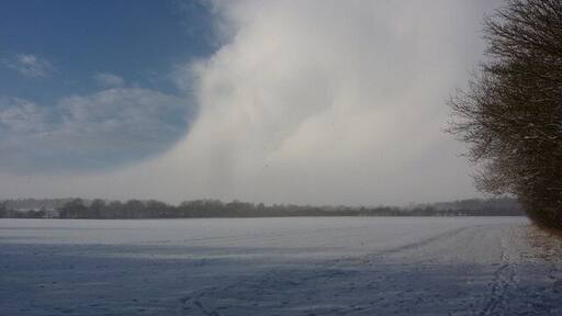 Field and clearing snow shower clouds Seen from a gateway on the Thornham estate, with no public access beyond into the field itself.
