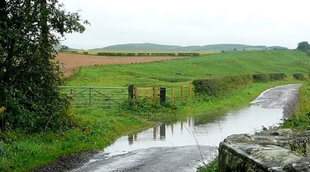 Flooded lane near Powburn This minor road crosses the Fawdon Burn on this bridge, and also crosses from Alnwick District to Berwick-upon-Tweed District. The flooding seems to be due to run off from the fields meeting a low point on the lane, rather than the burn being high.