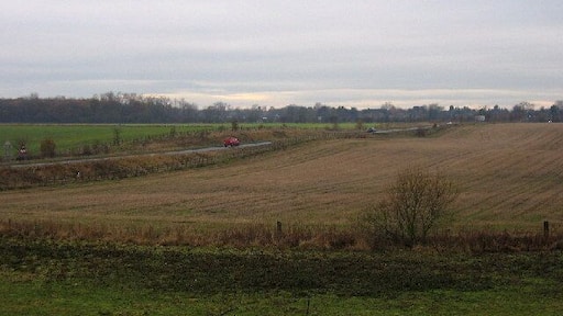 The B6454 heading west towards Darras Hall. Officially known as the Callerton Lane Link Road it was built in 1990 to bypass Ponteland and link directly with the Darras Hall estate the outskirts of which can be seen in the distance.