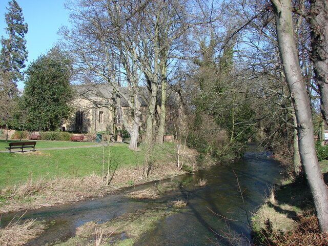 The River Pont, Ponteland. View of the river with St Mary's Church in the background