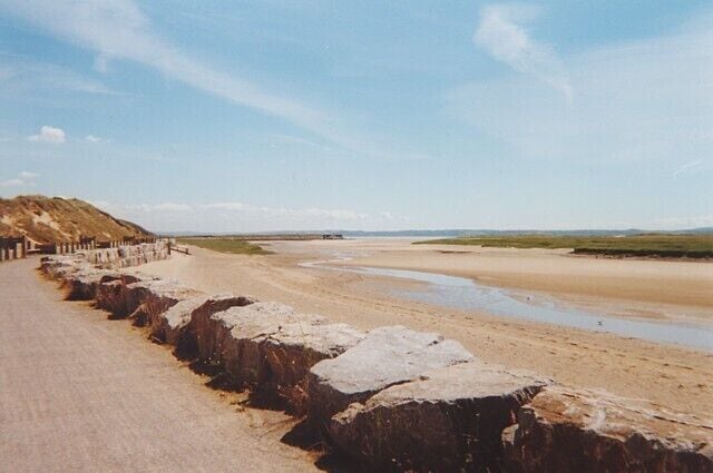 The Millennium Coastal Path at Pembrey This is part of National Cycle Network route 4 where it runs along the edge of the dunes at Pembrey at the western end of the Llanelli Millennium Coastal Park. The 22km long park was mostly reclaimed from industrial wasteland and otherwise useless waste products - 800,000 tons of pulverised fuel ash from the site of the Carmarthen Bay power station and sewage sludge and silt from Burry Port harbour - were used in the reclamation process.