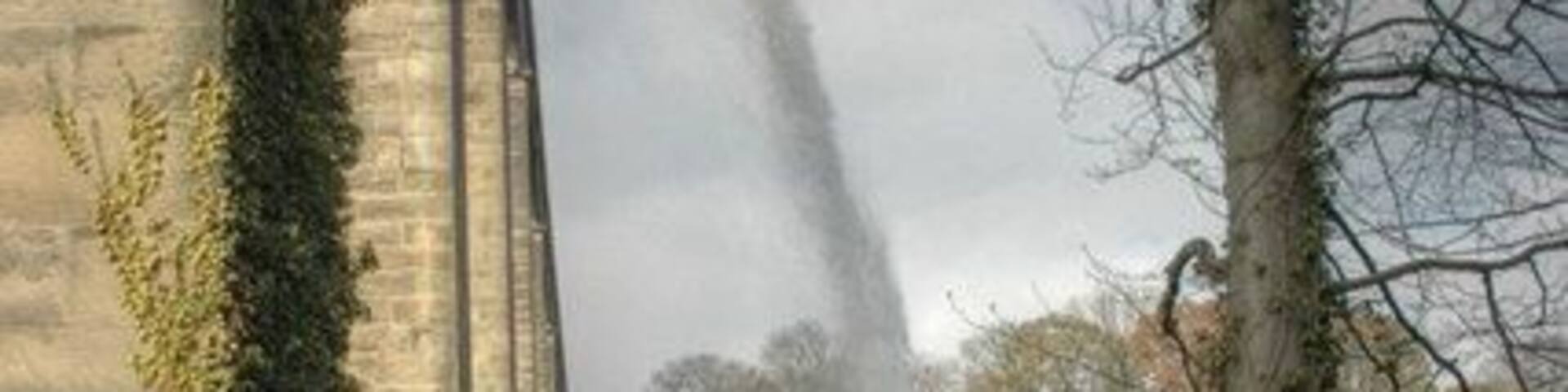 Draining Pontcysyllte, Aqueduct Water issuing out of the eastern side of Pontcysyllte Aqueduct, and pouring into the River Dee. The aqueduct is being drained to prepare it for safety inspections, and maintenance.