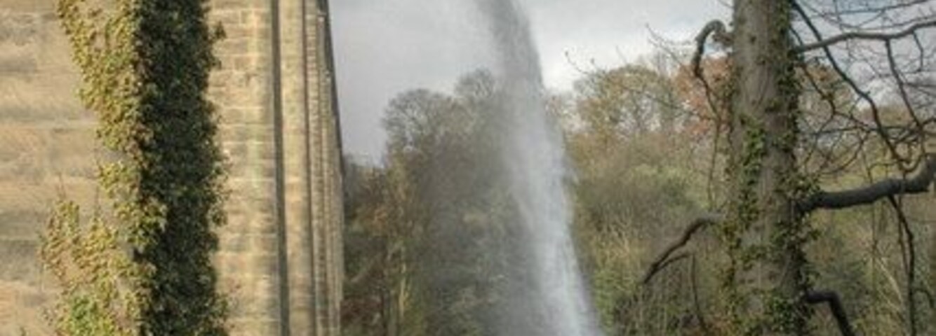 Draining Pontcysyllte, Aqueduct Water issuing out of the eastern side of Pontcysyllte Aqueduct, and pouring into the River Dee. The aqueduct is being drained to prepare it for safety inspections, and maintenance.