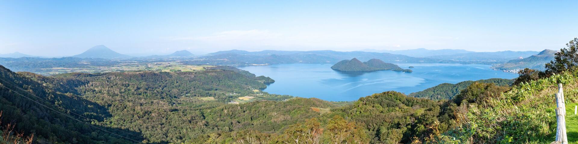 The whole view of Lake Toya. Panoramic image. Hokkaido, Japan