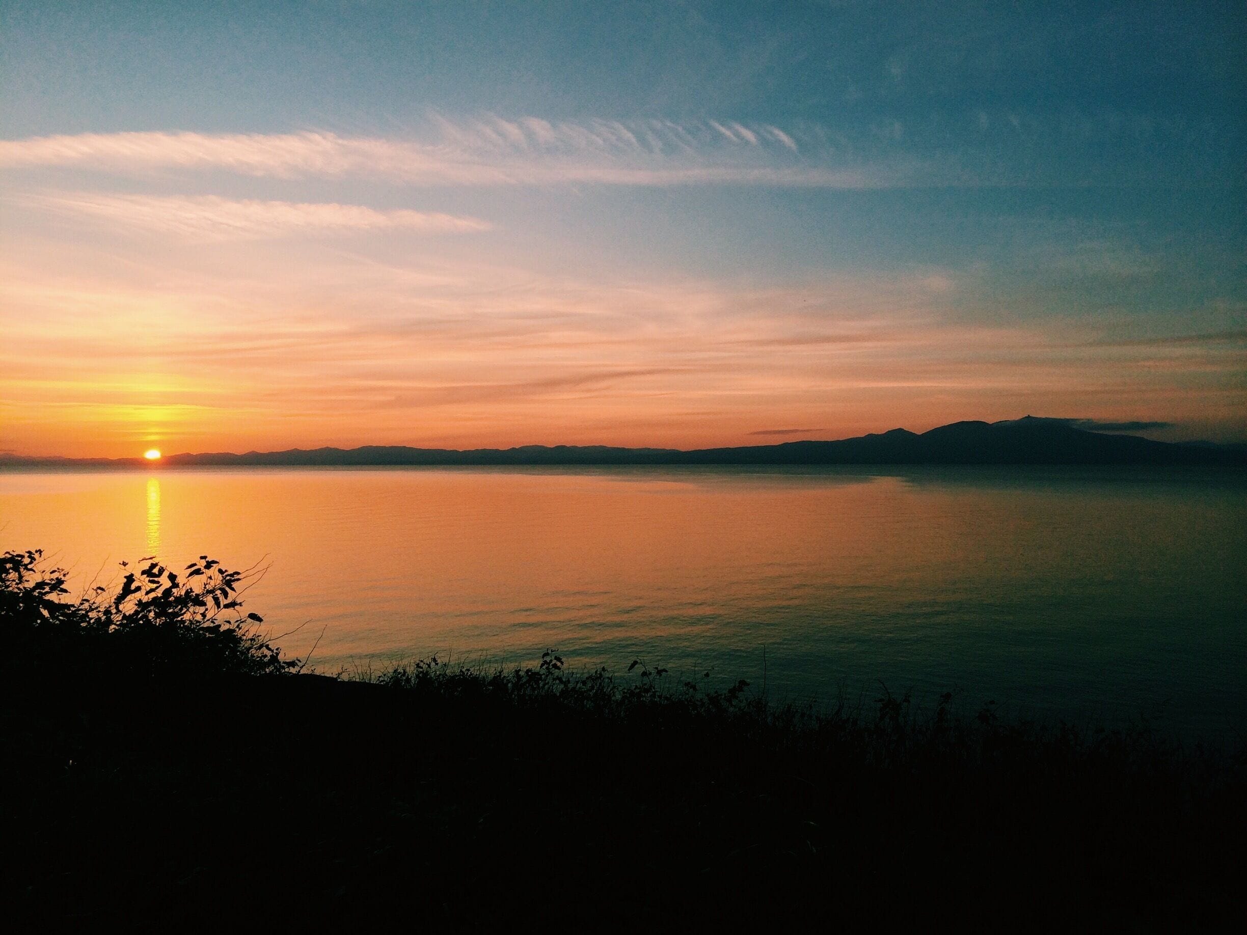 While driving along the coast of the Shimokita Peninsula we caught a beautiful sunset over the Mutsu Bay. Northern Japan is often ignored in the guidebooks, but the natural beauty it offers is not to be missed. Take the Shinkansen from Tokyo up to Aomori and from there the local trains and buses will do the rest.  #goldenhour
