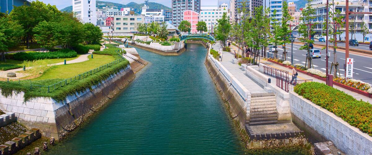Downtown of Nagasaki city with city quay and canal river. Nagasaki City