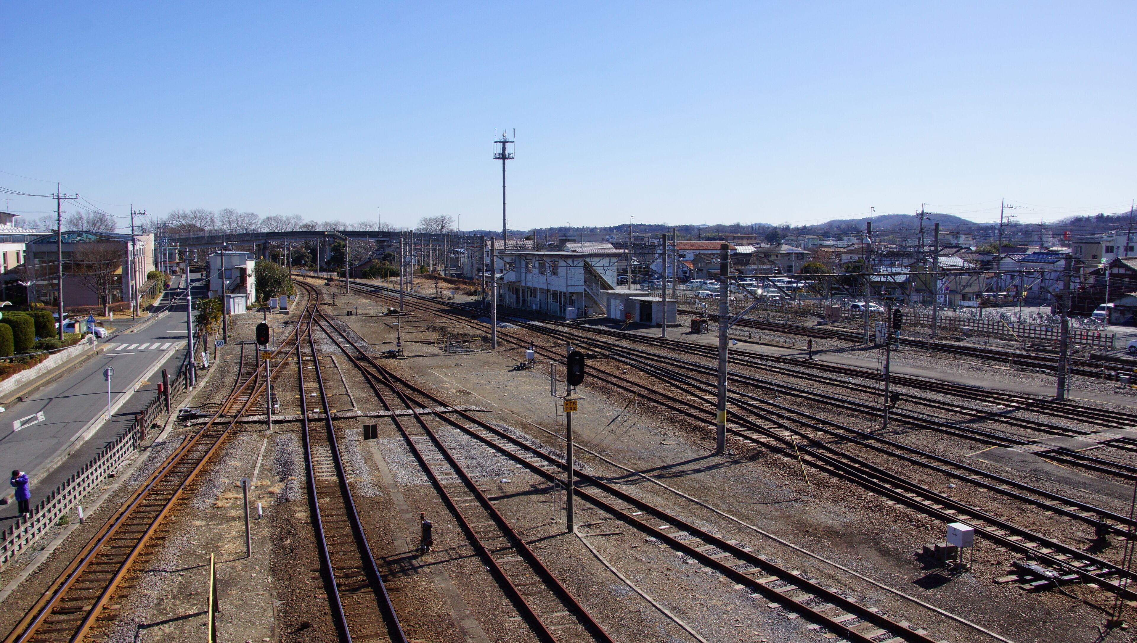 The view looking east from Yorii Station in Saitama Prefecture, Japan, with the JR Hachiko Line on the left, Chichibu Main Line in the middle, and Tobu Tojo Line on the right