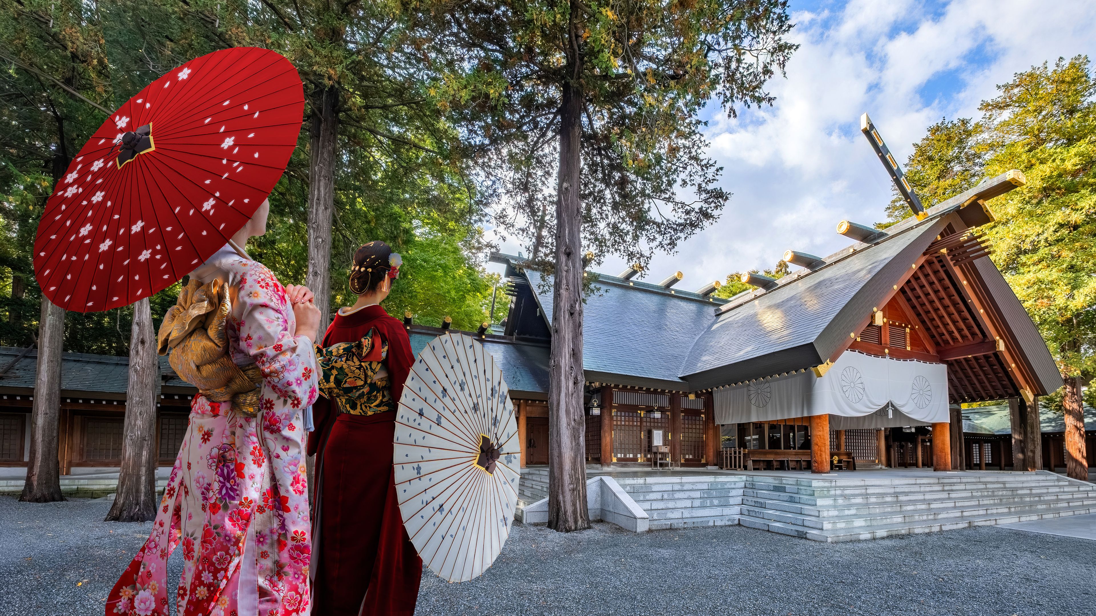 Young Japanese woman in a traditional Kimono dress at Hokkaido Shrine in Sapporo, Hokkaido, Japan