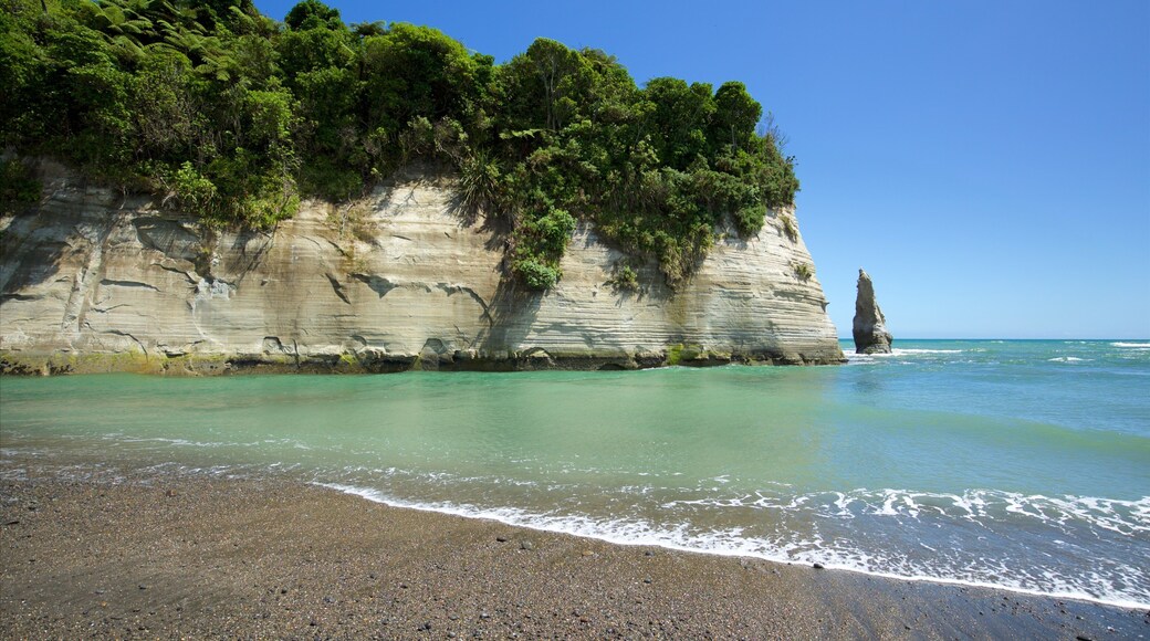 Urenui featuring rugged coastline, general coastal views and a pebble beach
