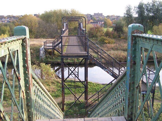 Canal Footbridge, Parkgate, Rotherham. Viewed from the Railway Footbridge ... the two bridges form a continuous public footpath over two man made obstacles. The Eastwood area of Rotherham is in the distance ... no doubt the footpath leads there - eventually. 1567071 1567076 1567100 1567116