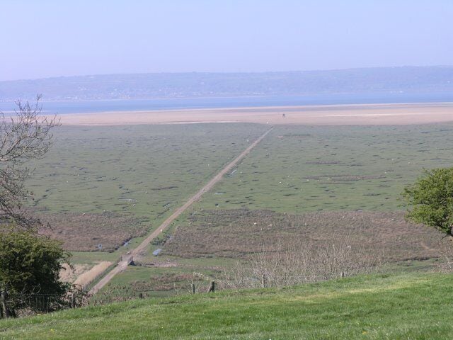 Causeway, taken from the castle The causeway that runs all the way to the estuary through the salt marches, taken from Weobly Castle.