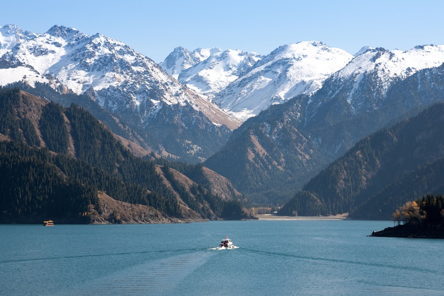 A boat cruise at Heavenly lake, Xinjiang Tianshan, China