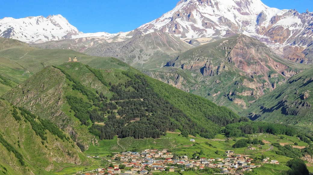 The majestic Mount Kazbek, standing at 5033 metres above sea level.
When we arrived into Kazbegi the mountain was all in shade and there was a lot of cloud around.
However when we awoke the next morning, this was our view from the balcony of our room at Rooms Hotel Kazbegi.
To read more about the places I visited on my 10-day Georgia itinerary by public transport, click on the following link.
https://galloparoundtheglobe.com/a-10-day-georgia-itinerary-by-public-transport/